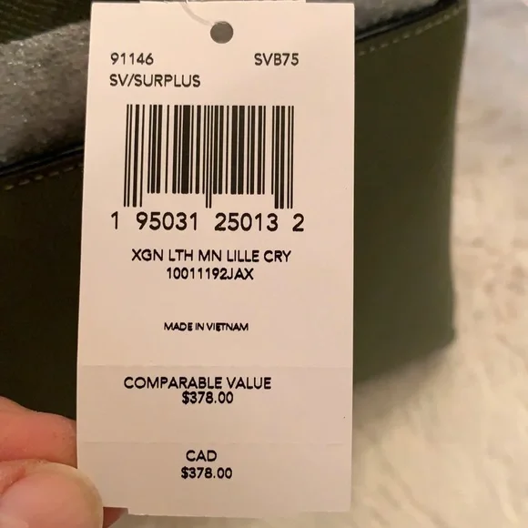 NWT. Coach Minicarryall - Picture 4 of 7